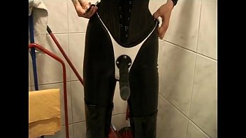 Two Dominas Drop Candle Wax On A Slave Two Dominas Drop Candle Wax On A Slave