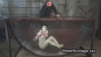 Brunette In Rope Bondage Dive In Water Brunette In Rope Bondage Dive In Water