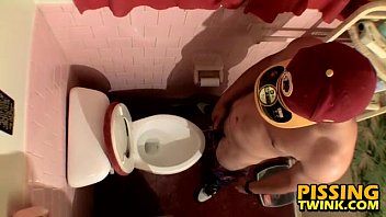 Cute Twink Flops Out His Cock And Pisses In The Toilet Bowl Cute Twink Flops Out His Cock And Pisses In The Toilet Bowl
